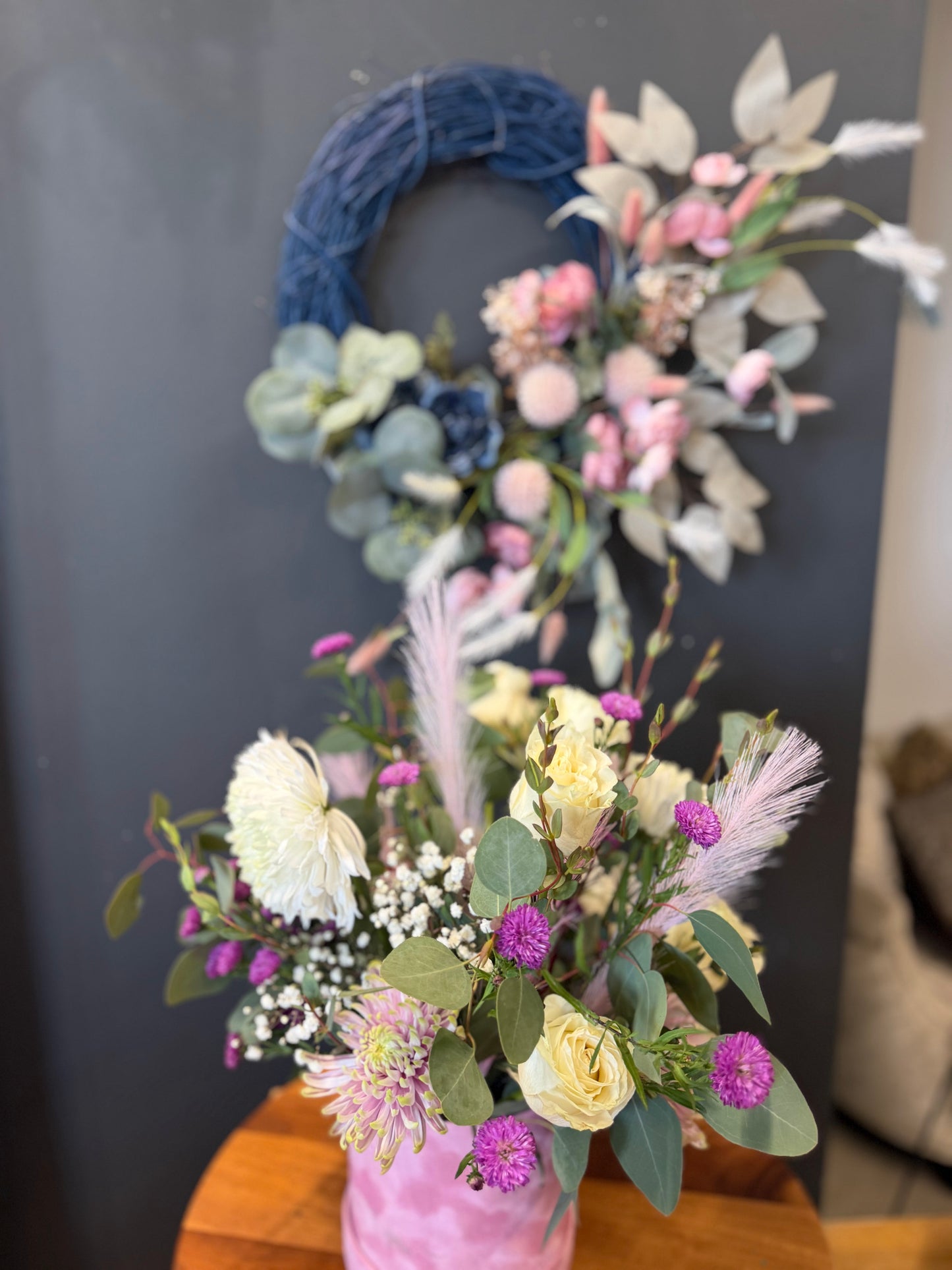 Bundle fresh floral centerpiece and faux floral wreath